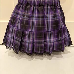 NWOT SHEIN Purple plaid Skirt with black lace detail on hem. XS, US 2